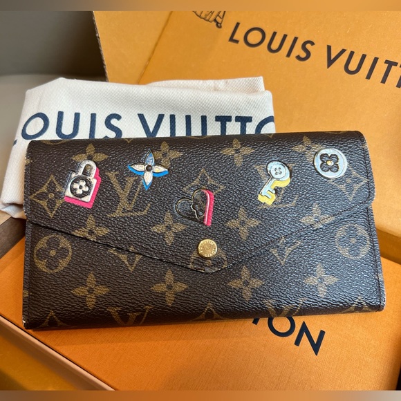 Louis Vuitton Handbags - Louis vuitton limited edition Monogram love Lock full size Sarah Wallet